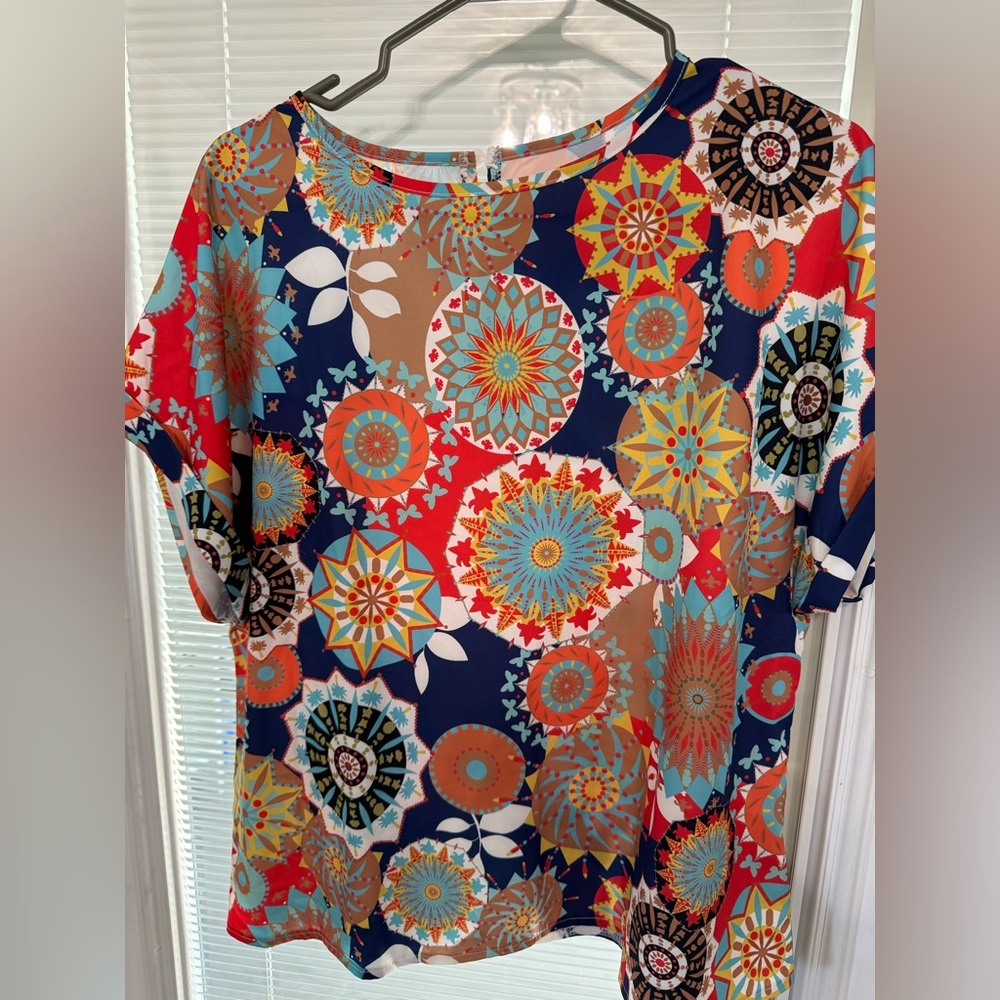 Colorful blouse, size large.